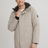Manteau d'hiver court beige pour homme. Chaud et confortable pour les hivers québécois. 