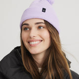 Tuque couleur lilas pour femme. Tuque à pompon. Chaude et confortable.