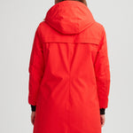 Manteau rouge feu pour femme. Bande réfléchissante au dos. Chaud et confortable pour les hivers québécois.